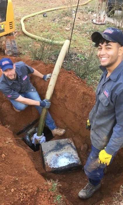 SepticRooter™ licensed technicians performing septic repair in Dacula, Gwinnett County